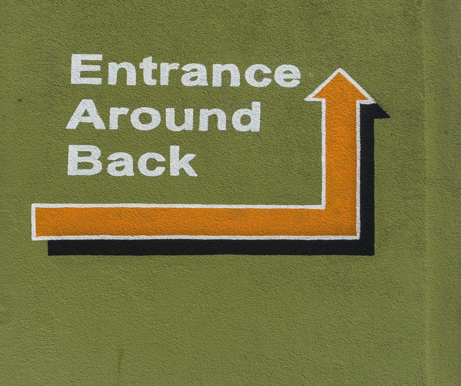 entrance around back signage